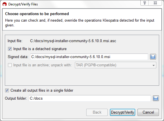 Shows available decrypt and verify options to perform. A MySQL Installer MSI file is used in the example where the .asc file is listed as "Input file" and the .msi file is listed under "Signed Data". The "Input file is detached signature" option's checkbox is checked. A "Input file is an archive; unpack with:" option is shown but greyed out. Below is the "Create all output files in a single folder" option checkbox that is checked, and an "Output folder" input field with "C:/docs" entered as an example. The available buttons are "Back" (greyed out), "Decrypt/Verify", and "Cancel."